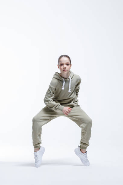 istock Young beautiful cool looking girl posing in studio 1326097268