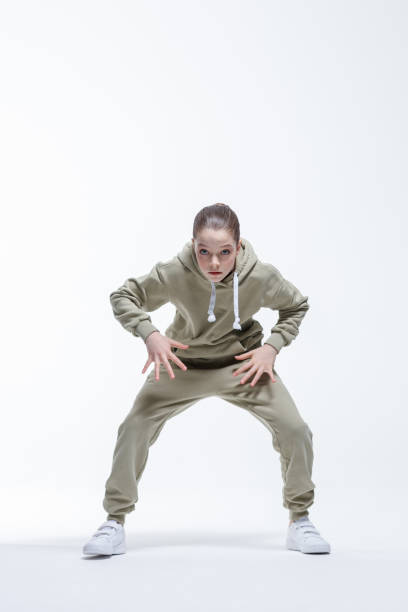 istock Young beautiful cool looking girl posing in studio 1326097754