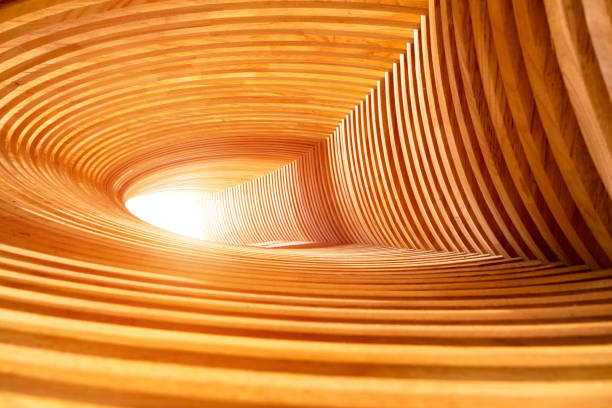 wooden tunnel leading to light, abstract concept of hope. stock photo