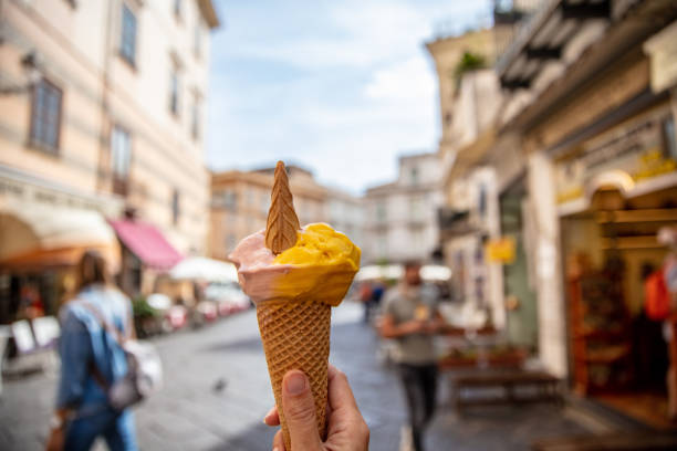 istock Close-up Of A Hand Holding Ice Cream 1326101836
