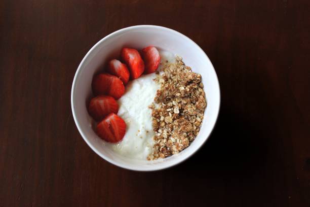 Breakfast bowl, healthy with yogurt, strawberries and granola