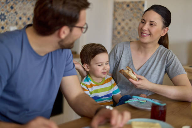 istock Parents spending some quality time with their adorable son at breakfast time 1326103701