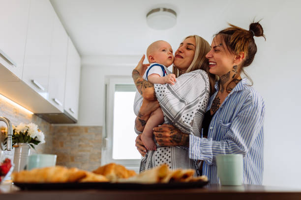 istock Affectionate women enjoying in time with a baby son at home 1326105264