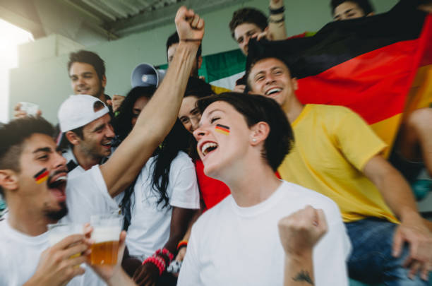 istock Germany supporters at stadium together 1326110884