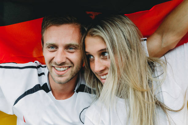 istock Germany supporters at stadium together 1326110891