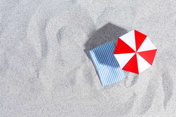 Summer Background. Sand, beach umbrella, sun lounger