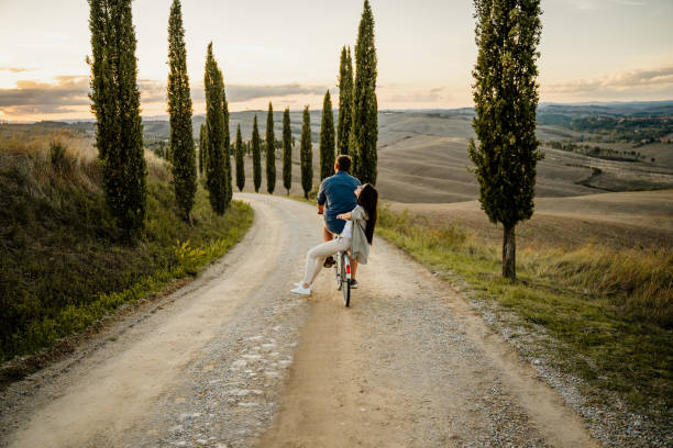 istock Couple riding on the bicycle 1326115401