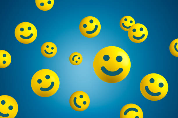 istock Yellow smiling balls flying on blue background. Happiness or customer satisfaction 1326116799