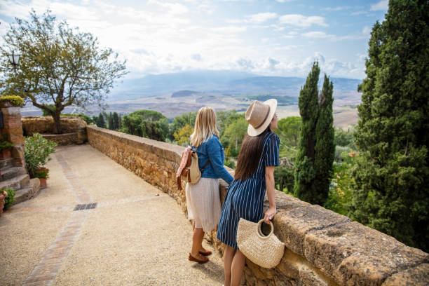 Mother and daughter admiring the view while on vacation