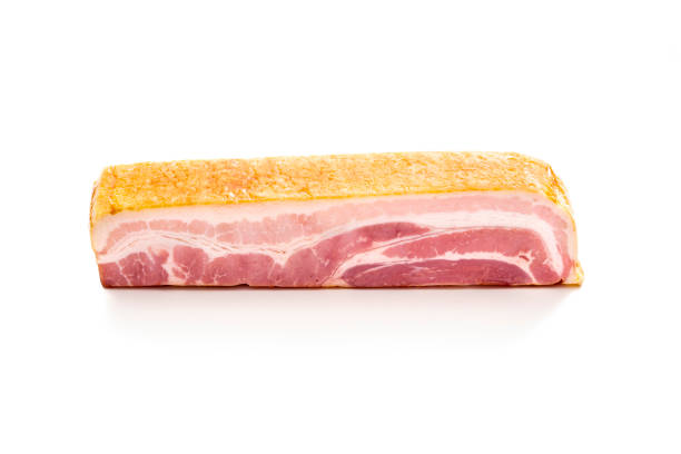Bacon pork meat piece raw isolated on white background with shadows