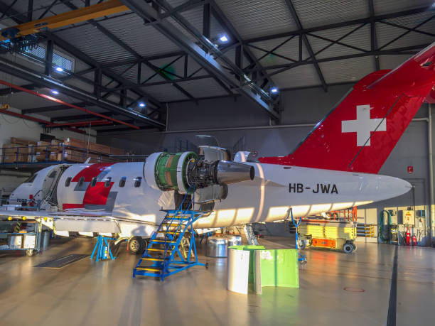 swiss rega air ambulance and rescue airplane - travel healthcare and medicine emergency services urgency imagens e fotografias de stock