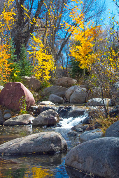 istock Waterfall-Small Waterfall with Fall Aspens-near Aspen Colorado 1326123679