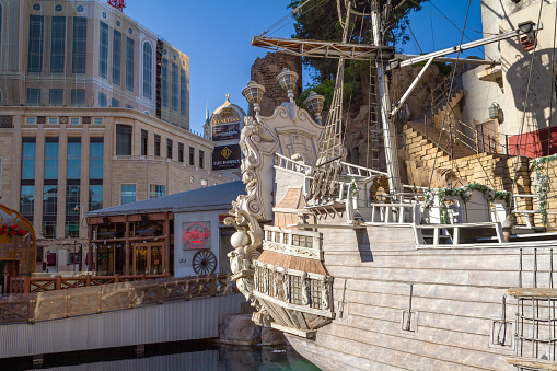 Las Vegas, NV, USA – June 8, 2021: Pirate ship in Buccaneer Bay at Treasure Island Hotel and Casino located in Las Vegas, Nevada.