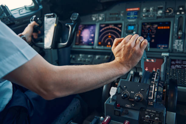 istock Aviator seated in the flight deck piloting an aircraft 1326132128