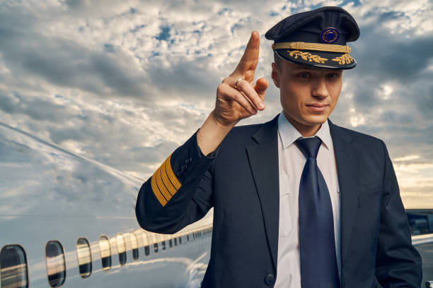 istock Young airline pilot showing his readiness for take-off 1326132385