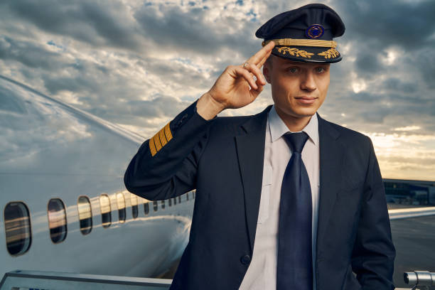 istock Male pilot demonstrating his readiness for flight 1326132393