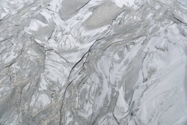 istock texture of fine gray sand mixed with water 1326132410