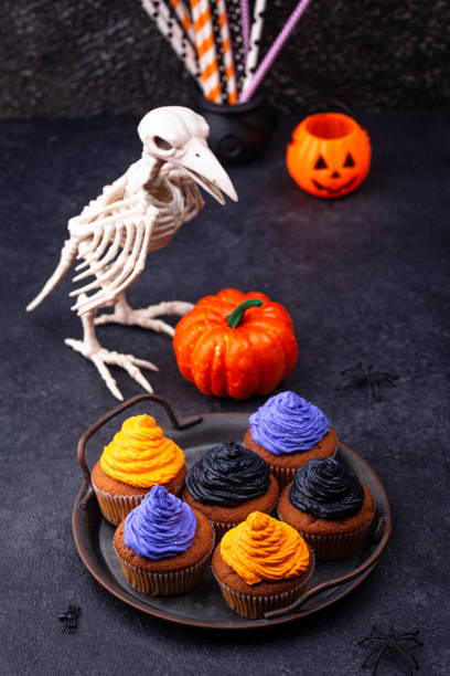 istock Halloween cupcakes with color cream 1326133779