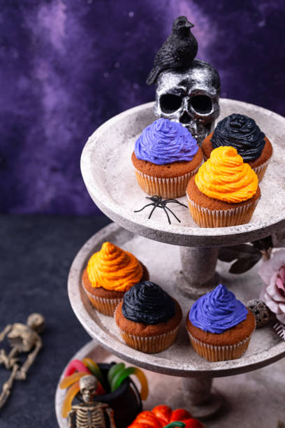 istock Halloween cupcakes with color cream 1326133787