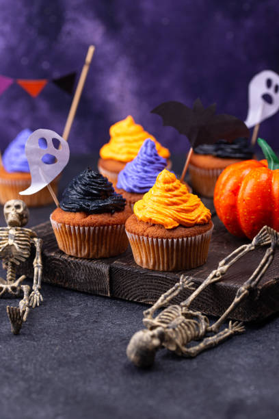 istock Halloween cupcakes with color cream 1326133788