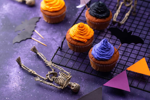 istock Halloween cupcakes with color cream 1326133792