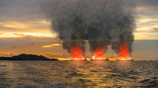 istock shipping fleet or many large general cargo ship for logistic import export goods the explosion and had fire smoke at the offshore sea horizon with sunset in evening 1326134801