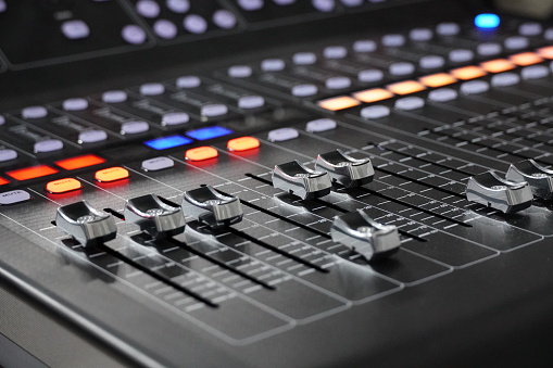 Audio DJ sound mixer control panel remote for music. close up view macro closeup