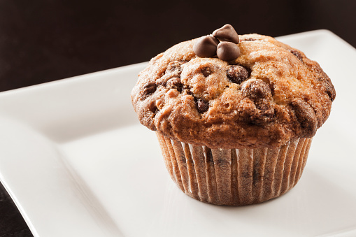 Freshly baked chocolate chip muffin.