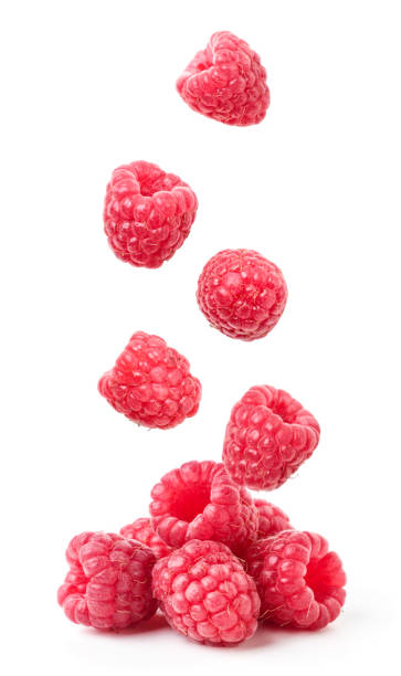 istock Ripe strawberry falls on a heap on a white background. Isolated 1326140115