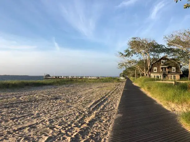 A boardwalk by Great South Bay in Saltaire, Fire Island, New York.