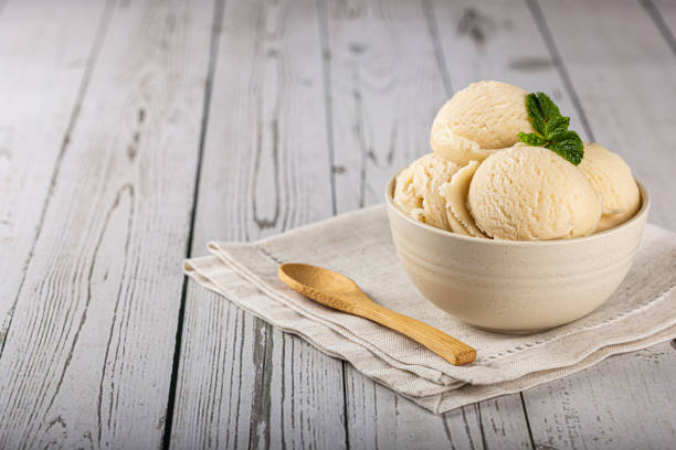 istock Bowl with vanilla ice cream balls. 1326143930