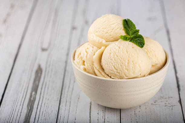 istock Bowl with vanilla ice cream balls. 1326143933