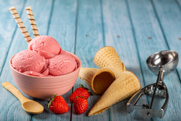 istock Bowl with strawberry ice cream balls. 1326144004