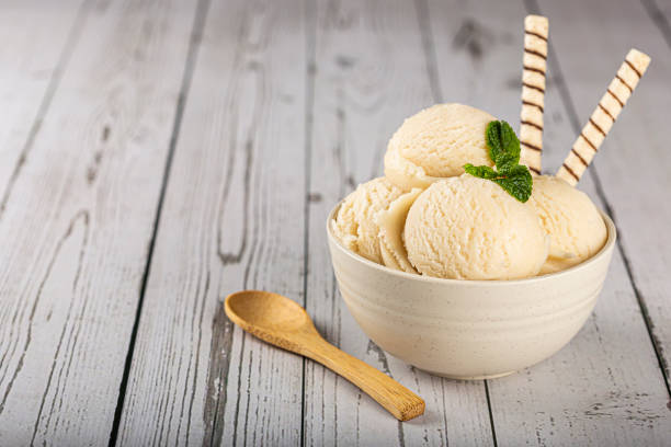 istock Bowl with vanilla ice cream balls. 1326144024