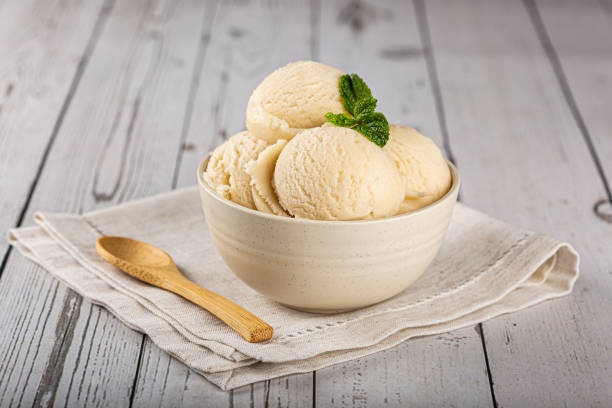 istock Bowl with vanilla ice cream balls. 1326144027