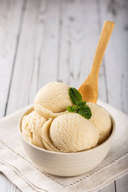 istock Bowl with vanilla ice cream balls. 1326144028