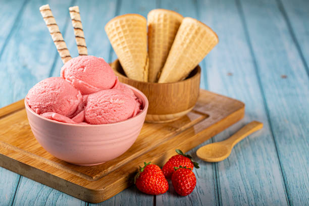istock Bowl with strawberry ice cream balls. 1326144037