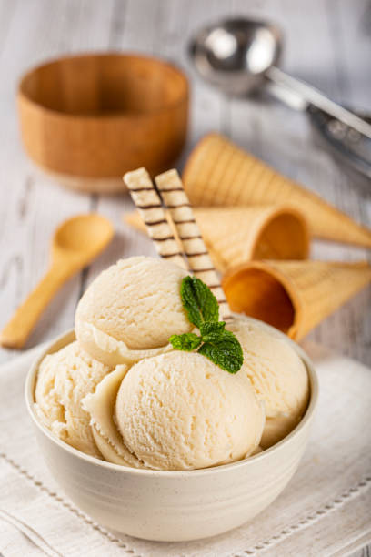 istock Bowl with vanilla ice cream balls. 1326144048