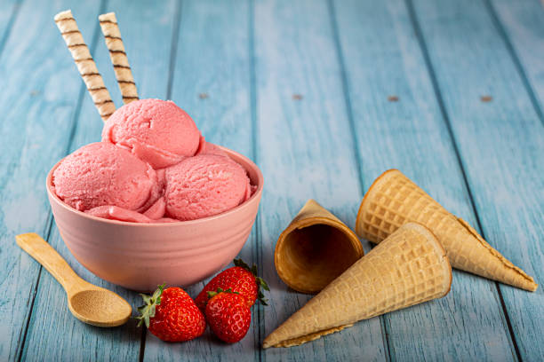 istock Bowl with strawberry ice cream balls. 1326144050