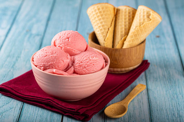istock Bowl with strawberry ice cream balls. 1326144056