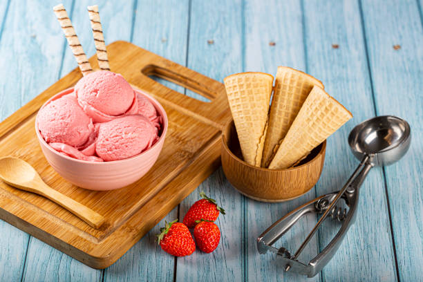 istock Bowl with strawberry ice cream balls. 1326144088