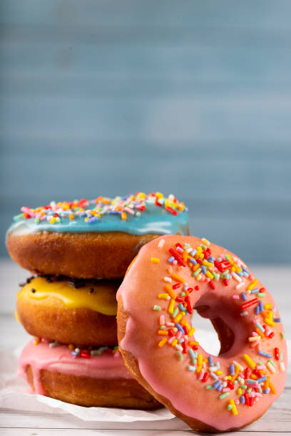 istock Delicious assorted colorful donuts on the table. 1326145843