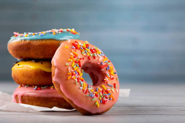 istock Delicious assorted colorful donuts on the table. 1326146348