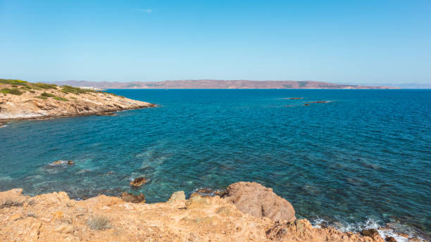 istock Rocky cliffs, blue sea shore landscape, Greece 1326148606