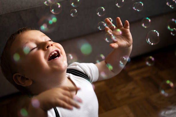 Catching Soap Bubbles in living room