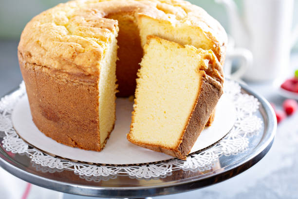 Pound cake slice Pound cake or angel food cake sliced on a cake stand cake stock pictures, royalty-free photos & images
