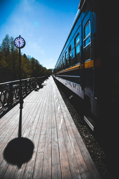 istock view of the train station, train carriages and vocal clock 1326150082