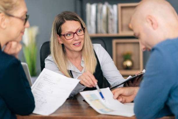 istock Couple talking with financial advisor on a meeting 1326152655