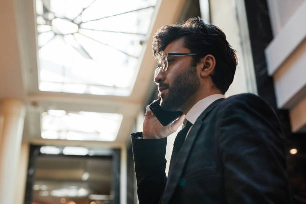istock Middle Eastern Businessman Speaking by Smartphone 1326153646