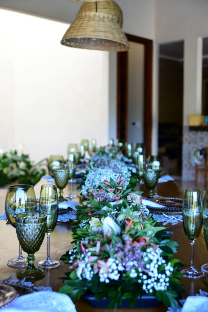 istock restaurant table set with cutlery dishes and flower arrangements 1326153989